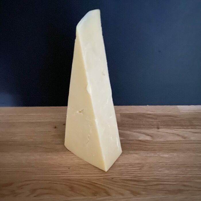 Keens Mature Cheddar slant view scaled 1