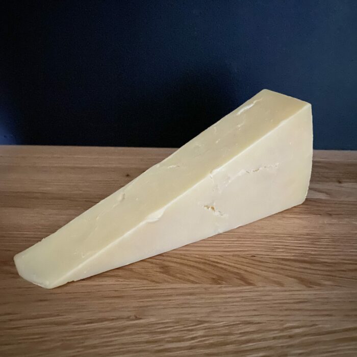 Keens Mature Cheddar sloped view scaled 1