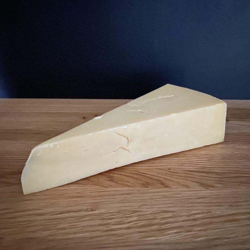 Keens mature cheddar side view scaled 1